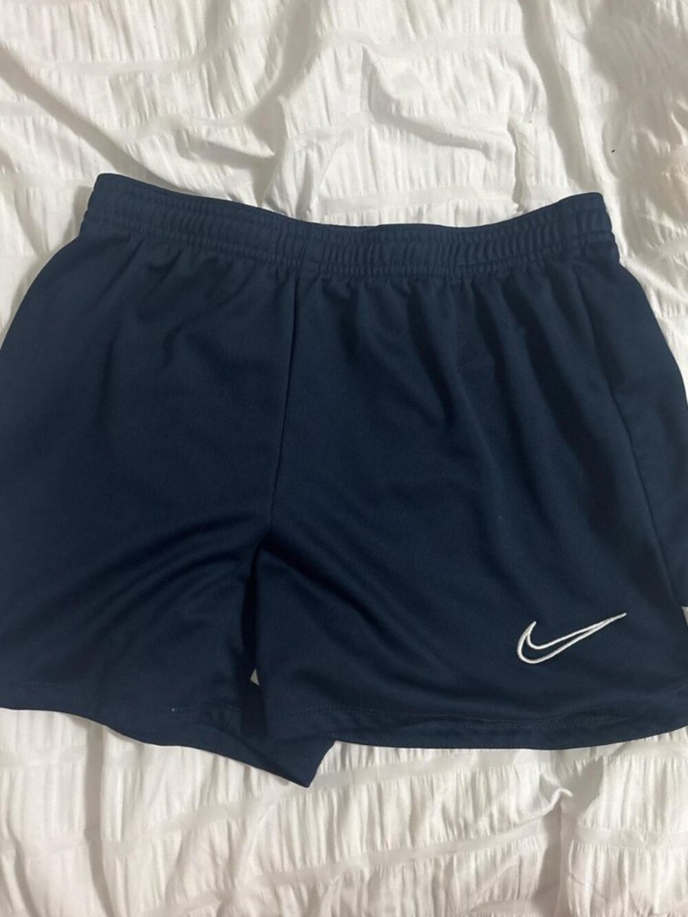 navy blue nike soccer shorts kids L/womens XS